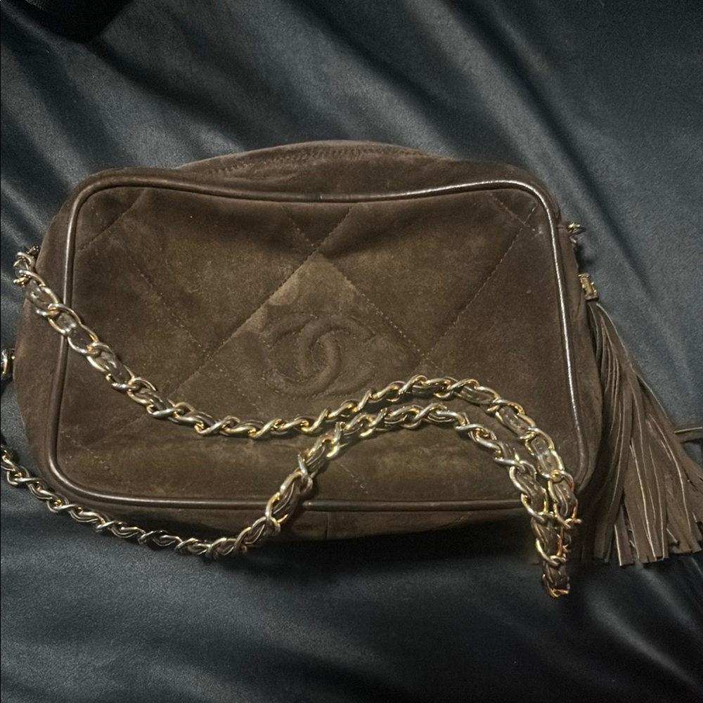 CHANEL Brown Crossbody Bag with Chain Strap and Quilted Design